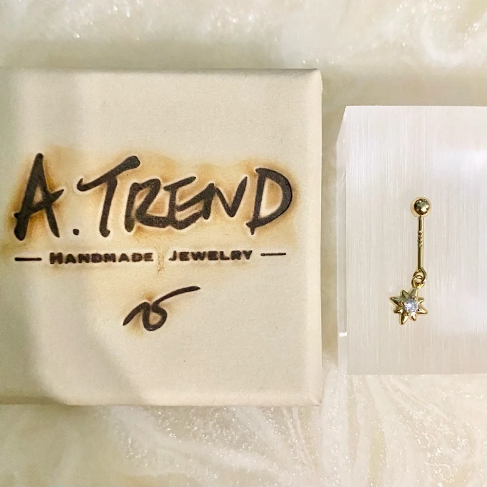 Gold Starburst Drop vertical cartilage Earring
